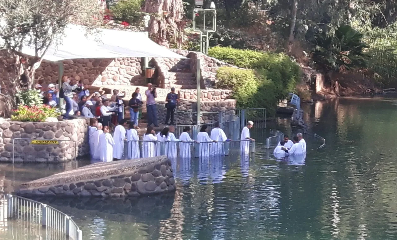 Baptism in the river Jordan in the Holy Land